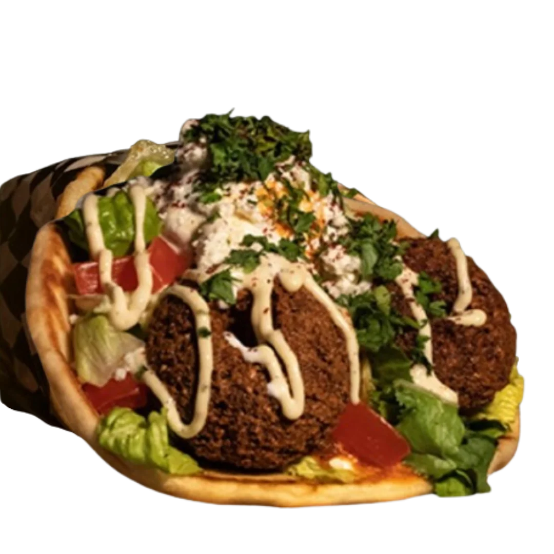 Crispy falafel gyro with tzatziki fresh vegetables and feta on pita Portland food cart